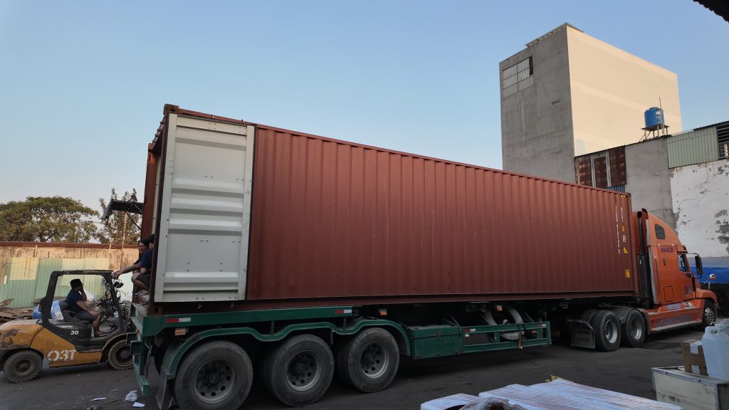 Xe Container chở hàng đi Hải An